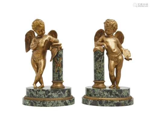 169-Paires d'amours en bronze ciselé et doré figurant de...