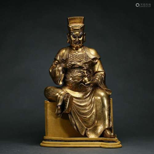 A Bronze-gilt Seated Guardian
