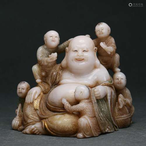 A Carved Soapstone Budai