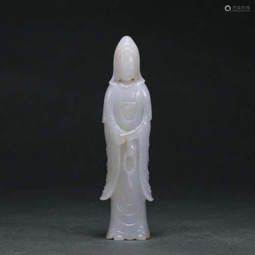 A Carved White Jade Standing Guanyin
