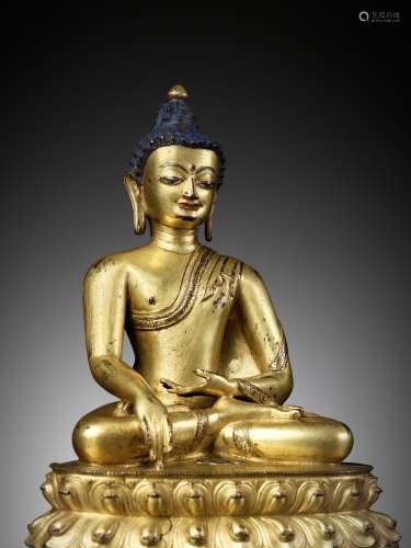 A GILT BRONZE FIGURE OF BUDDHA SHAKYAMUNI, 15TH CENTURY