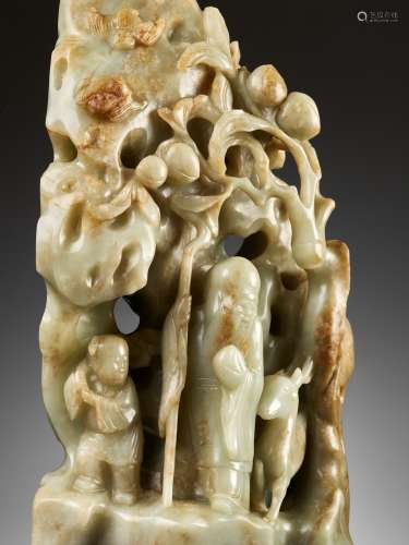 A LARGE ‘SHOULAO GROTTO’, DEEP CELADON AND RUSSET JADE, 18TH...