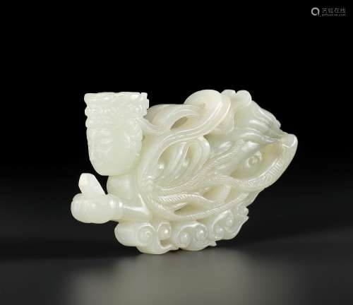 A WHITE JADE CARVING OF AN APSARA, QING DYNASTY OR EARLIER
