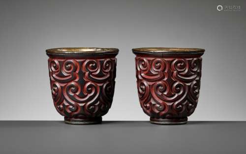 A PAIR OF RARE FORM TIXI LACQUER TALL CUPS, MING DYNASTY