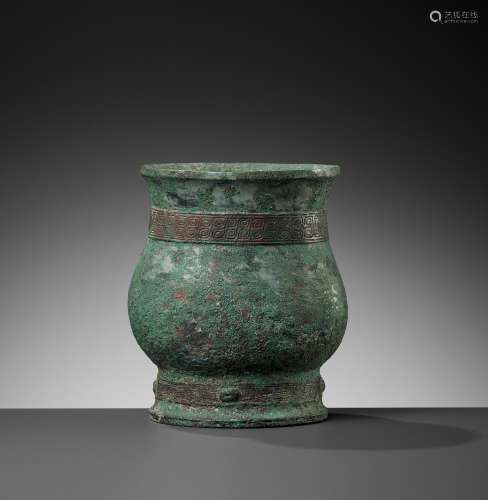 A BRONZE RITUAL WINE CUP, ZHI, LATE SHANG TO EARLY WESTERN Z...