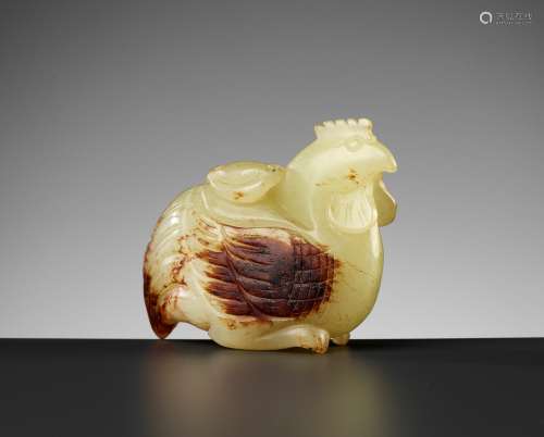 A YELLOW AND RUSSET JADE FIGURE OF A CHICKEN, EARLY QING DYN...
