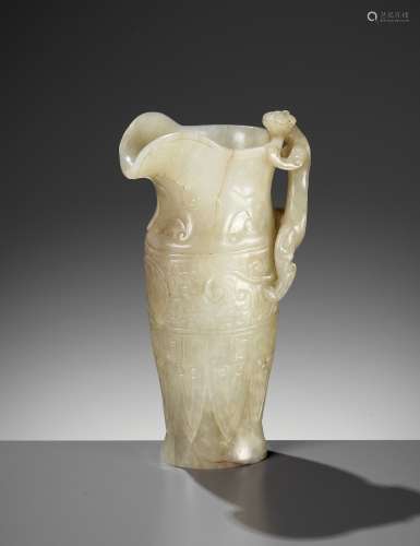 AN IMPERIAL CELADON AND RUSSET JADE ‘CHILONG’ RHYTON, QIANLO...