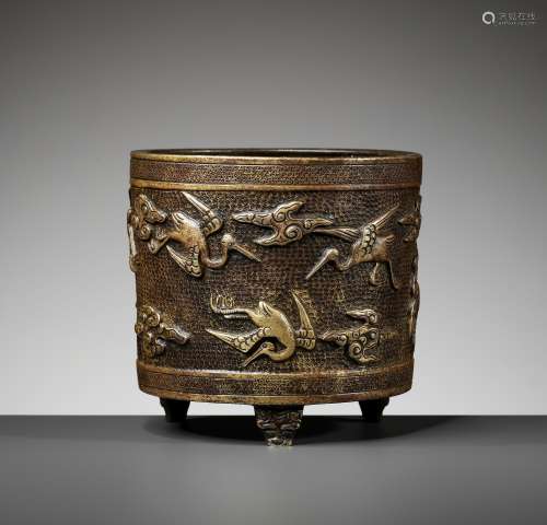 A HU WENMING PARCEL-GILT TRIPOD CENSER, MING DYNASTY