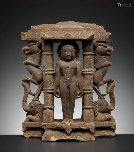 A JAIN SANDSTONE STELE OF A TIRTHANKARA, POSSIBLY MAHAVIRA