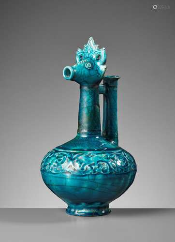 A KASHAN TURQUOISE-GLAZED ZOOMORPHIC POTTERY EWER