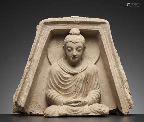 A STUCCO RELIEF DEPICTING BUDDHA IN A TRAPEZOIDAL NICHE, KUS...