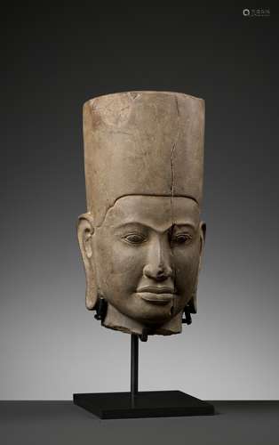 A SANDSTONE HEAD OF A MALE DEITY, PRE-ANGKOR PERIOD