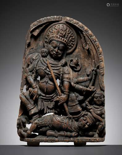 A CARVED WOOD STELE DEPICTING SHIVA SLAYING ANDHAKA, VIJAYAN...