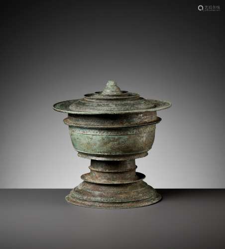 A KHMER BRONZE FOOTED BOWL AND COVER, ANGKOR PERIOD
