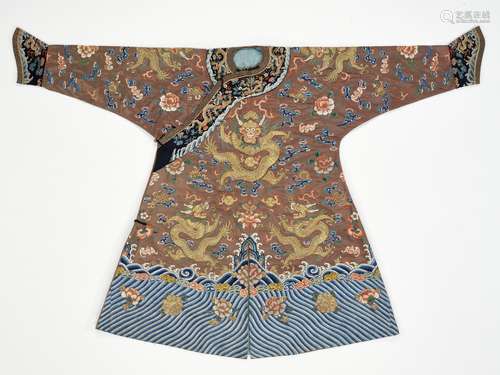 A RARE SILK EMBROIDERED CHESTNUT-GROUND CHILD’S DRAGON ROBE,...