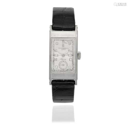 Patek Philippe. A fine platinum diamond set manual wind rect...