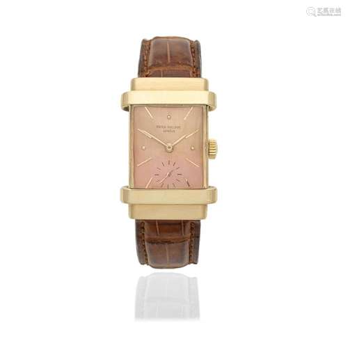 Patek Philippe. An 18K rose gold manual wind rectangular wri...