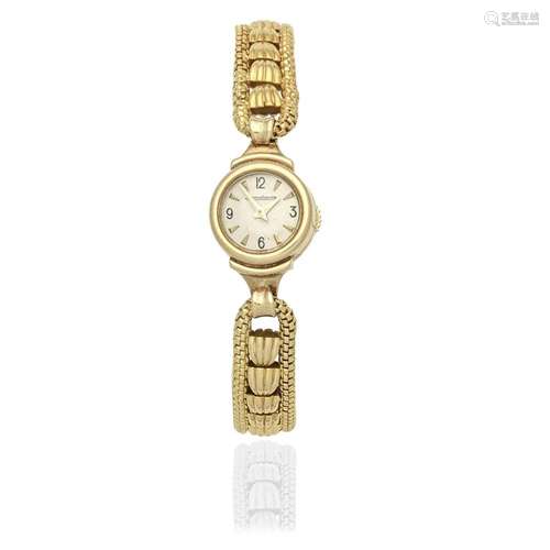 Jaeger-LeCoultre. A lady's 9K gold manual wind bracelet ...