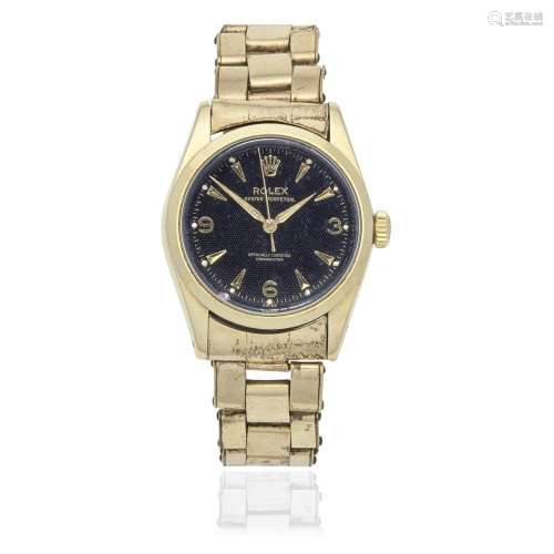 Rolex. A gold plated and stainless steel automatic bracelet ...
