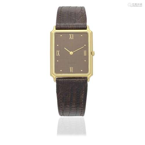 Baume & Mercier. An 18K gold quartz rectangular wristwat...