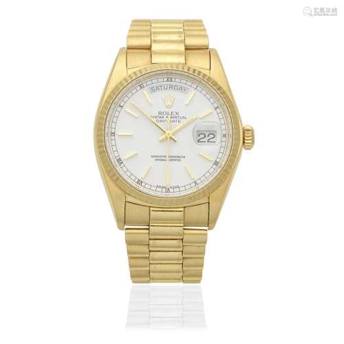 Rolex. An 18K gold automatic calendar bracelet watch with th...