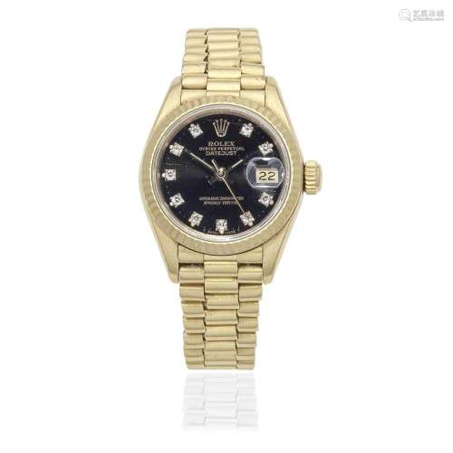 Rolex. A lady's 18K gold diamond set automatic calendar ...