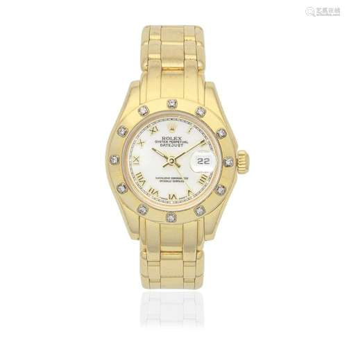 Rolex. A lady's 18K gold and diamond set automatic calen...