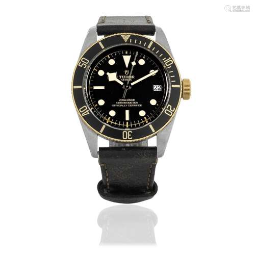 Tudor. A stainless steel and gold automatic calendar wristwa...