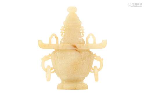 A CHINESE YELLOW JADE VASE AND COVER.