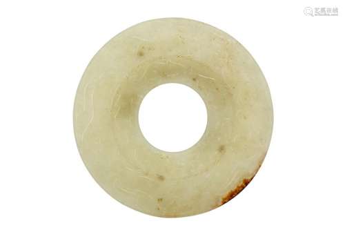 A CHINESE YELLOW JADE ARCHAISTIC DISC, BI.