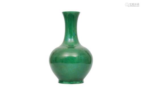 A CHINESE APPLE GREEN-GLAZED VASE.