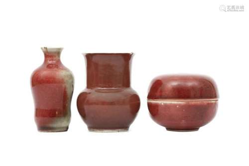 THREE CHINESE COPPER RED-GLAZED SCHOLAR'S DESK ITEMS.