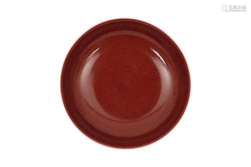 A CHINESE COPPER RED-ENAMELLED DISH.