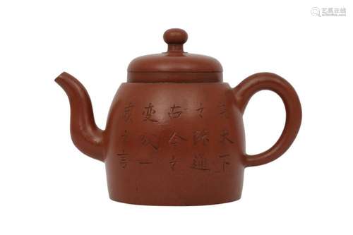 A CHINESE YIXING ZISHA 'CALLIGRAPHY' TEAPOT AND COVE...