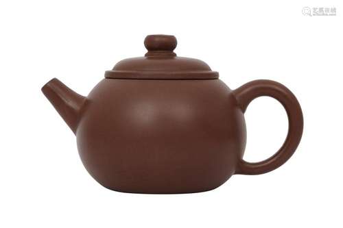 A CHINESE YIXING ZISHA TEAPOT AND COVER.