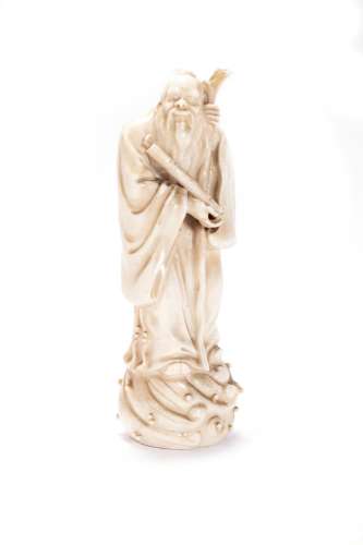 Blanc de Chine sculpture depicting a wise man, China late 19...
