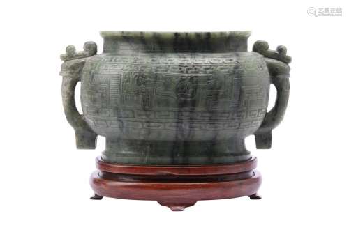 A MASSIVE CHINESE GREEN JADE ARCHAISTIC VASE.