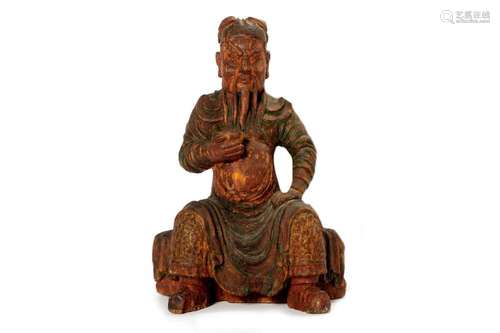 Ancient polychrome wooden sculpture depicting a seated digni...