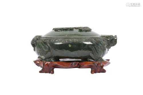 A CHINESE SPINACH-GREEN JADE 'DRAGON' VESSEL AND COV...