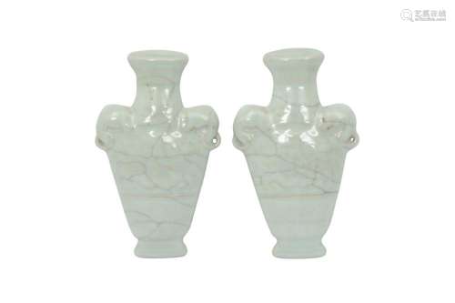 A PAIR OF CHINESE CELADON-GLAZED 'WALL VASE' PLAQUES...