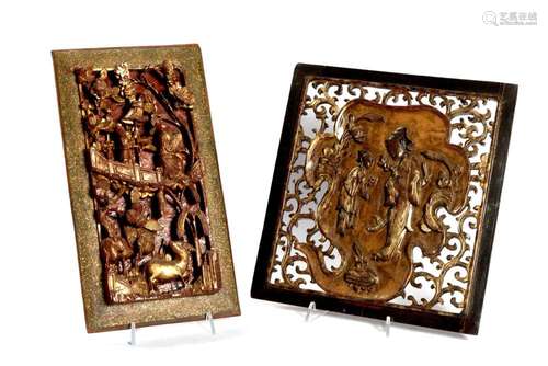 Two panels in lacquered and partially gilded wood, carved an...