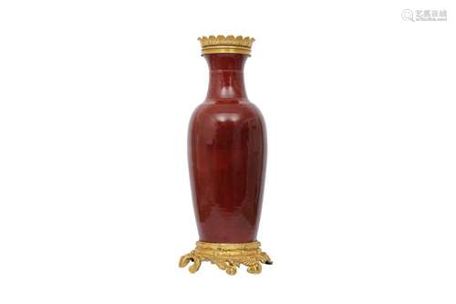 A LARGE CHINESE ORMOLU-MOUNTED COPPER RED-GLAZED VASE.