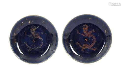 A PAIR OF BLUE-GLAZED GILT-DECORATED 'DRAGON' DISHES...