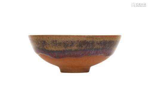 A SMALL CHINESE FLAMBE-GLAZED CUP.
