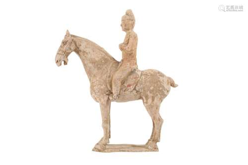 A CHINESE POTTERY HORSE AND RIDER.