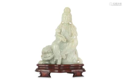 A LARGE CHINESE PALE CELADON JADE FIGURE OF GUANYIN.