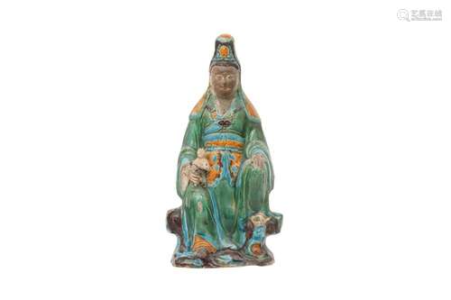 A CHINESE FAHUA-GLAZED GUANYIN AND CHILD GROUP.