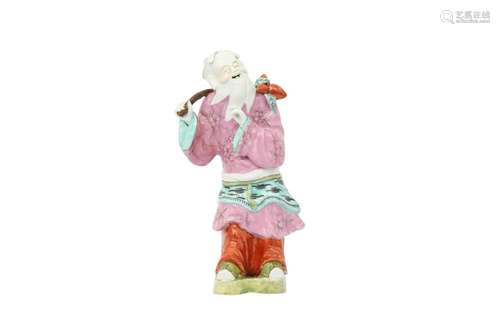 A CHINESE FAMILLE ROSE FIGURE OF AN IMMORTAL.