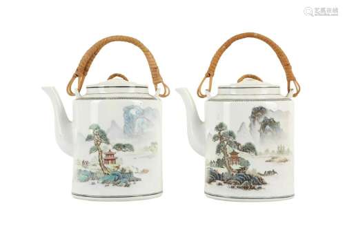 A PAIR OF CHINESE FAMILLE ROSE TEAPOTS AND COVERS.