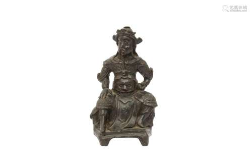 A CHINESE BRONZE GUANDI FIGURE.